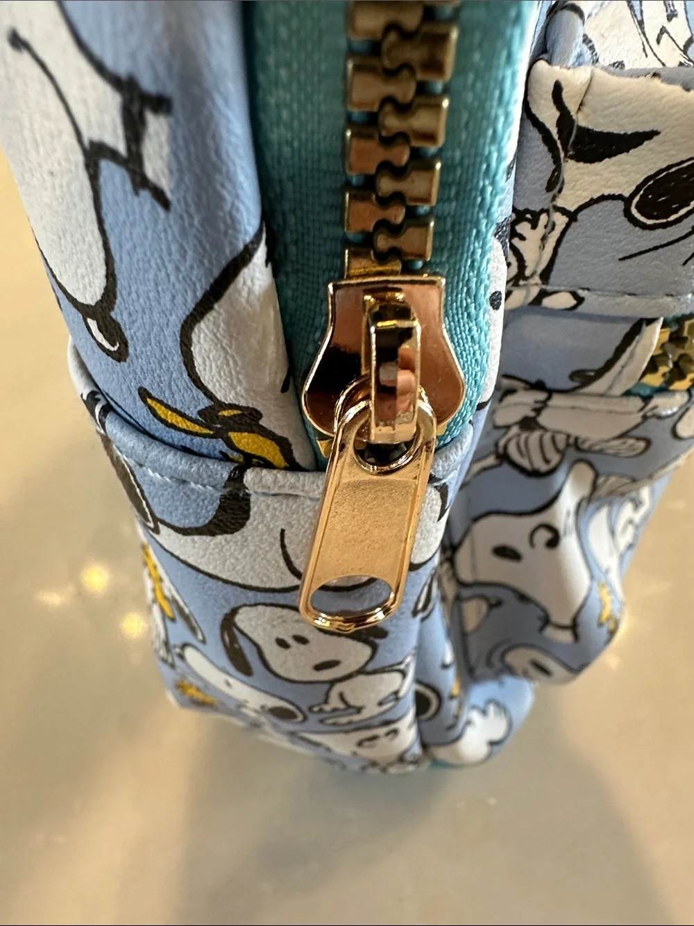 Peanuts Snoopy Mini Backpack in Light Blue with Woodstock Print
